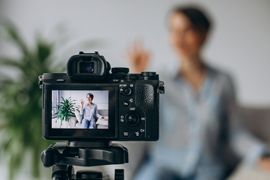 young-woman-blogger-recording-video-camera