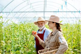 young-woman-with-grandfather-in-the-hothouse-with-2023-11-27-05-18-35-utc--1---1-