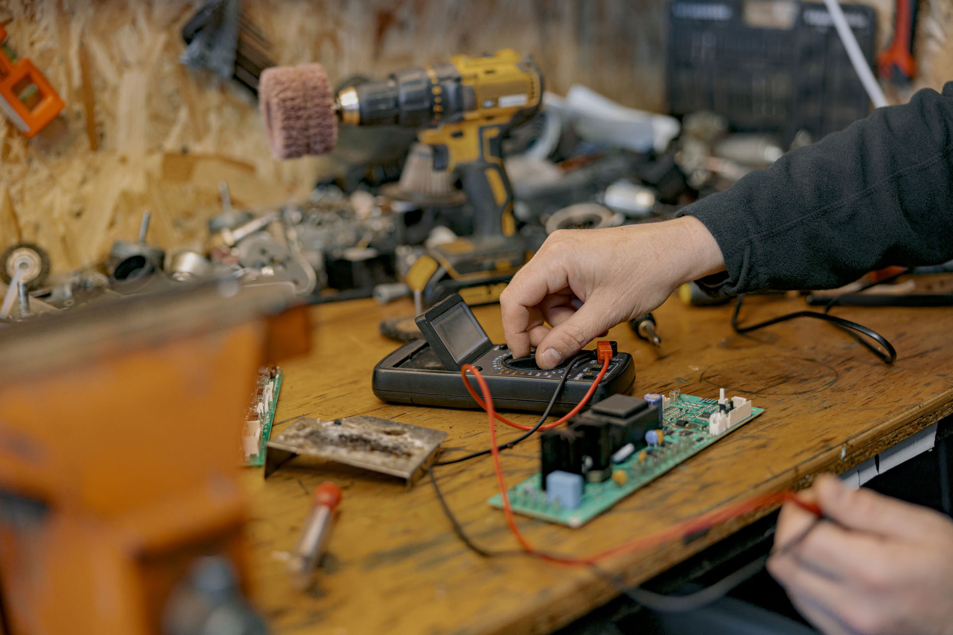 close-up-of-electrician-hands-checks-the-electrica-2023-11-27-05-22-50-utc--1---1-