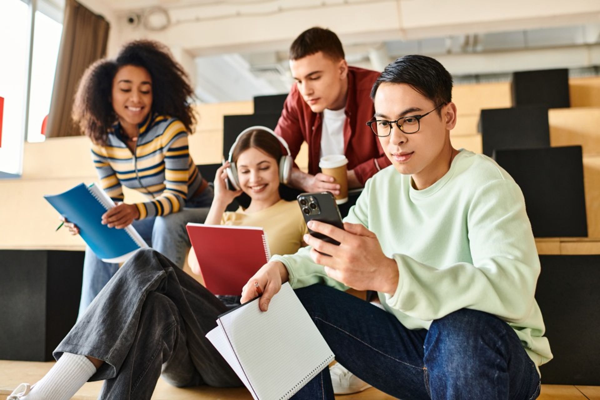 diverse-group-engrossed-in-digital-world-2024-05-24-20-10-46-utc--2-