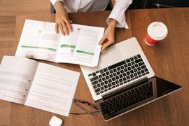 close-up-businesswoman-hands-working-while-sitting-2023-11-27-04-56-48-utc--1-