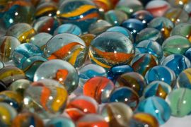 the-colorful-glass-marbles-a-game-of-the-past-2024-05-27-01-53-31-utc--1-