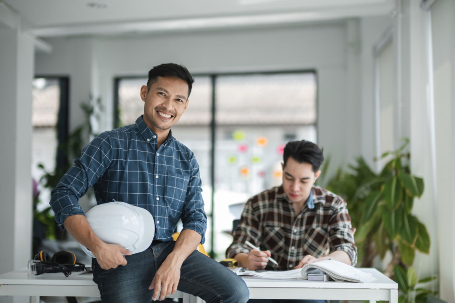 two-male-engineers-collaborating-in-a-modern-offic-2024-06-25-19-04-17-utc--1-