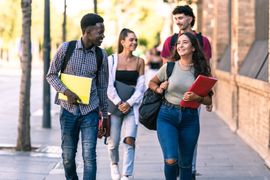 four-students-of-different-ethnicities-walking-in-2023-11-27-04-59-28-utc--1---2-