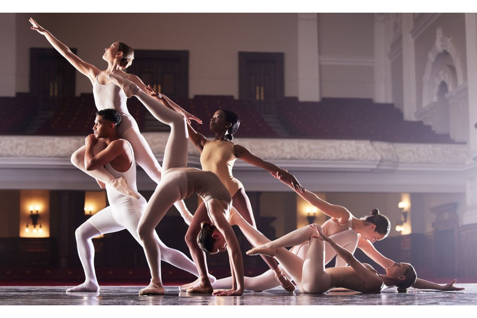 shot-of-a-group-of-diverse-ballet-dancers-performi-2023-11-27-05-28-55-utc--1-