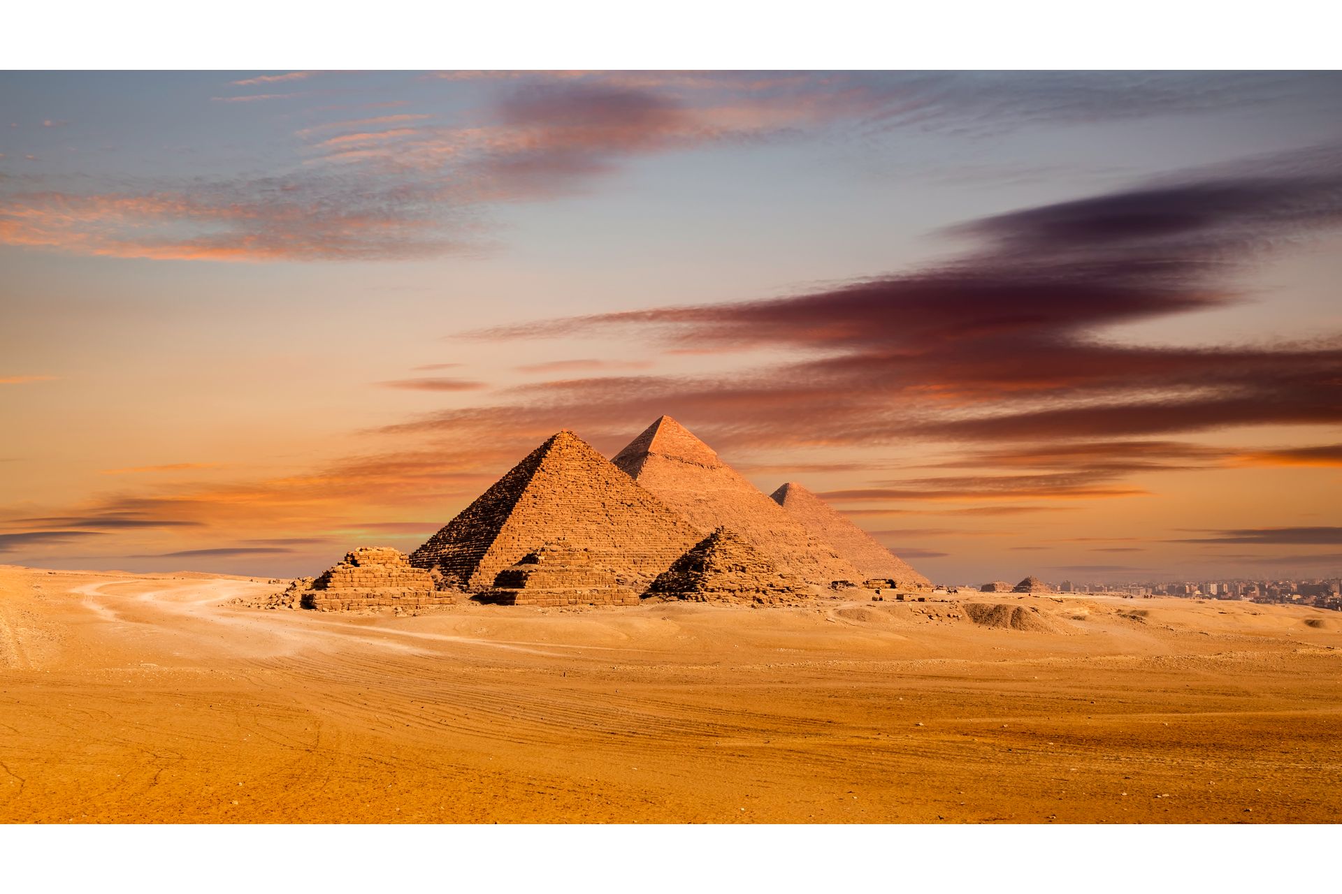 sunset-view-of-pyramid-complex-of-giza-in-cairo-2023-11-27-05-17-47-utc--1-