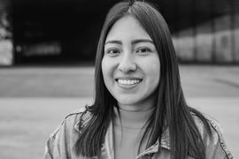 portrait-of-indigenous-young-woman-smiling-on-came-2023-11-27-05-21-05-utc--1-