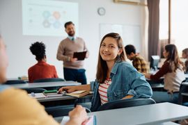 happy-college-student-during-a-lecture-in-the-clas-2023-11-27-05-24-30-utc--1---1-