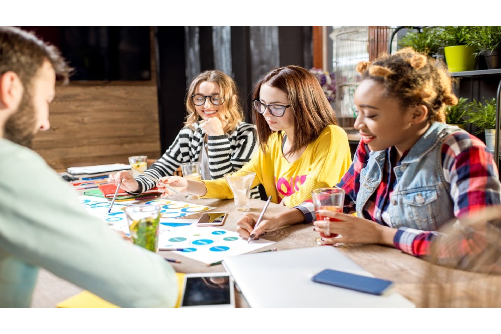 group-of-people-working-together-in-the-cafe-2023-11-27-04-54-37-utc--2-