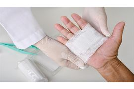 doctor-doing-wound-dressing-care-and-bandaging-pat-2023-11-27-05-02-03-utc--1-