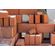 red-bricks-in-a-construction-warehouse-on-the-stre-2024-02-02-00-54-38-utc--1-