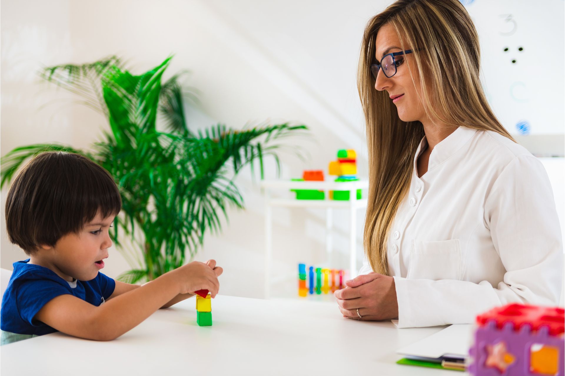 child-psychology-little-boy-making-tower-with-blo-2024-10-20-14-03-40-utc--1-