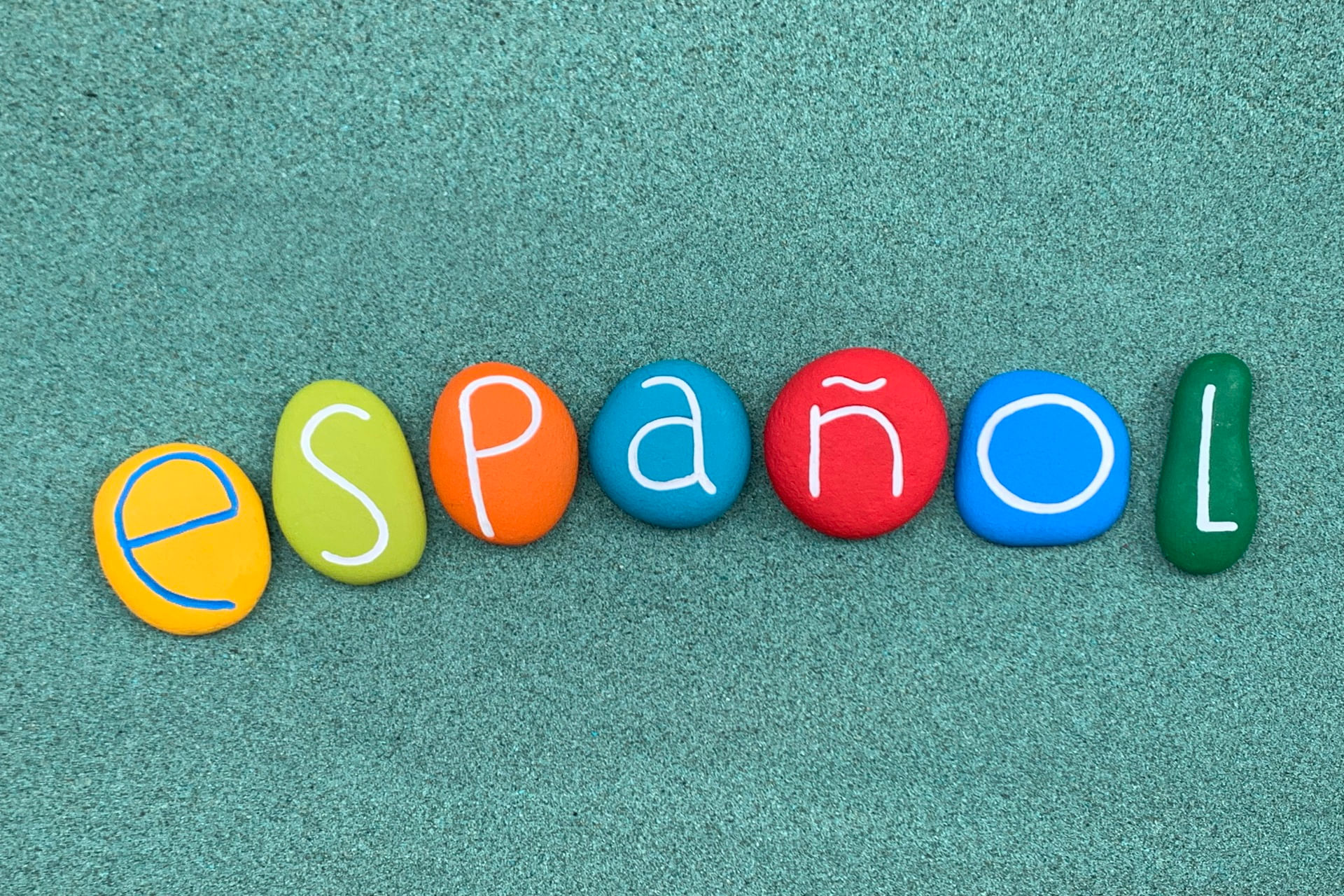 espanol-word-composed-with-multi-colored-stone-let-2024-05-27-00-50-14-utc--1-